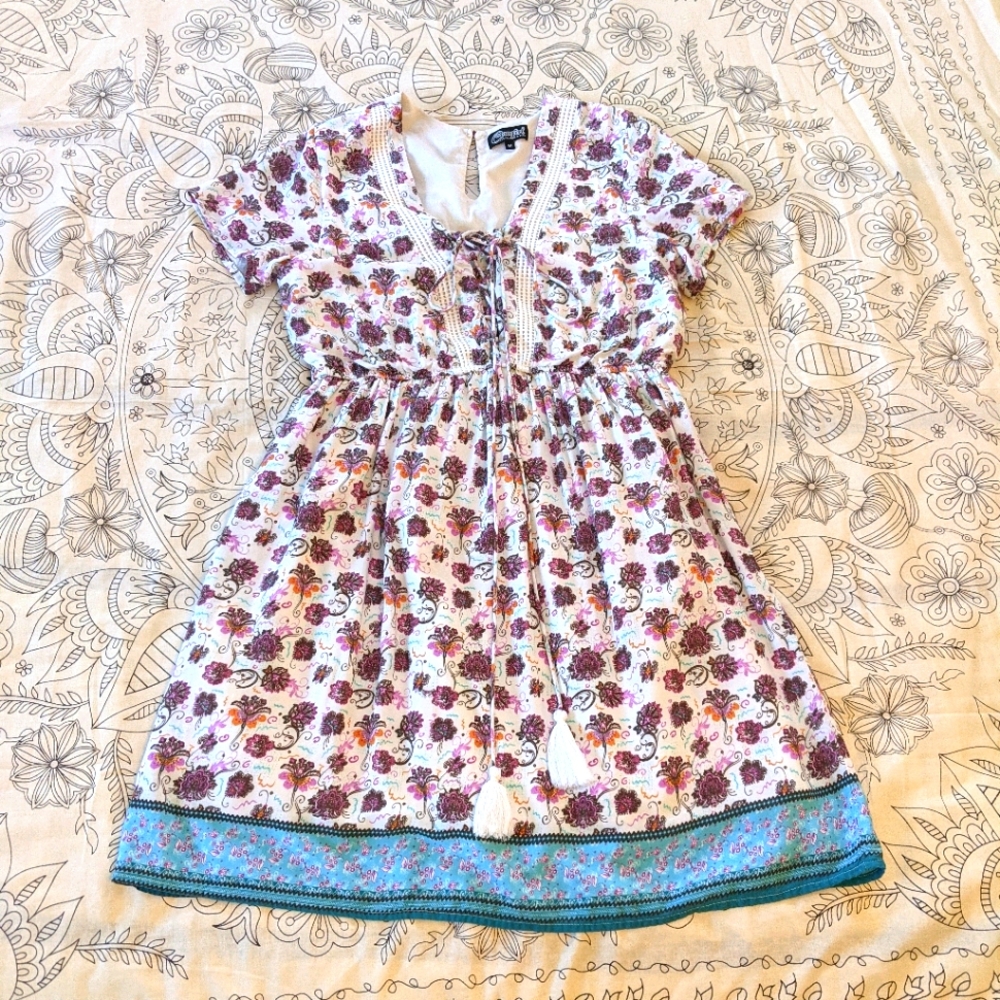 Flirty floral print lace up dress